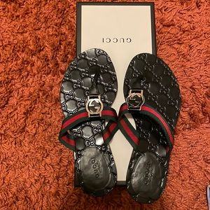 Black Gucci sandals